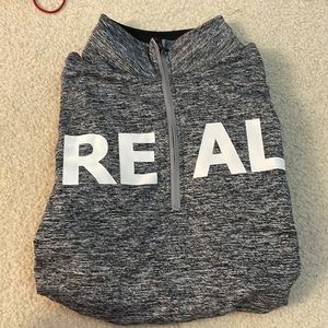 Quarter zip with finger holes